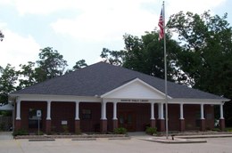 800 S.Redwood Ave., Kountze, Texas Logo